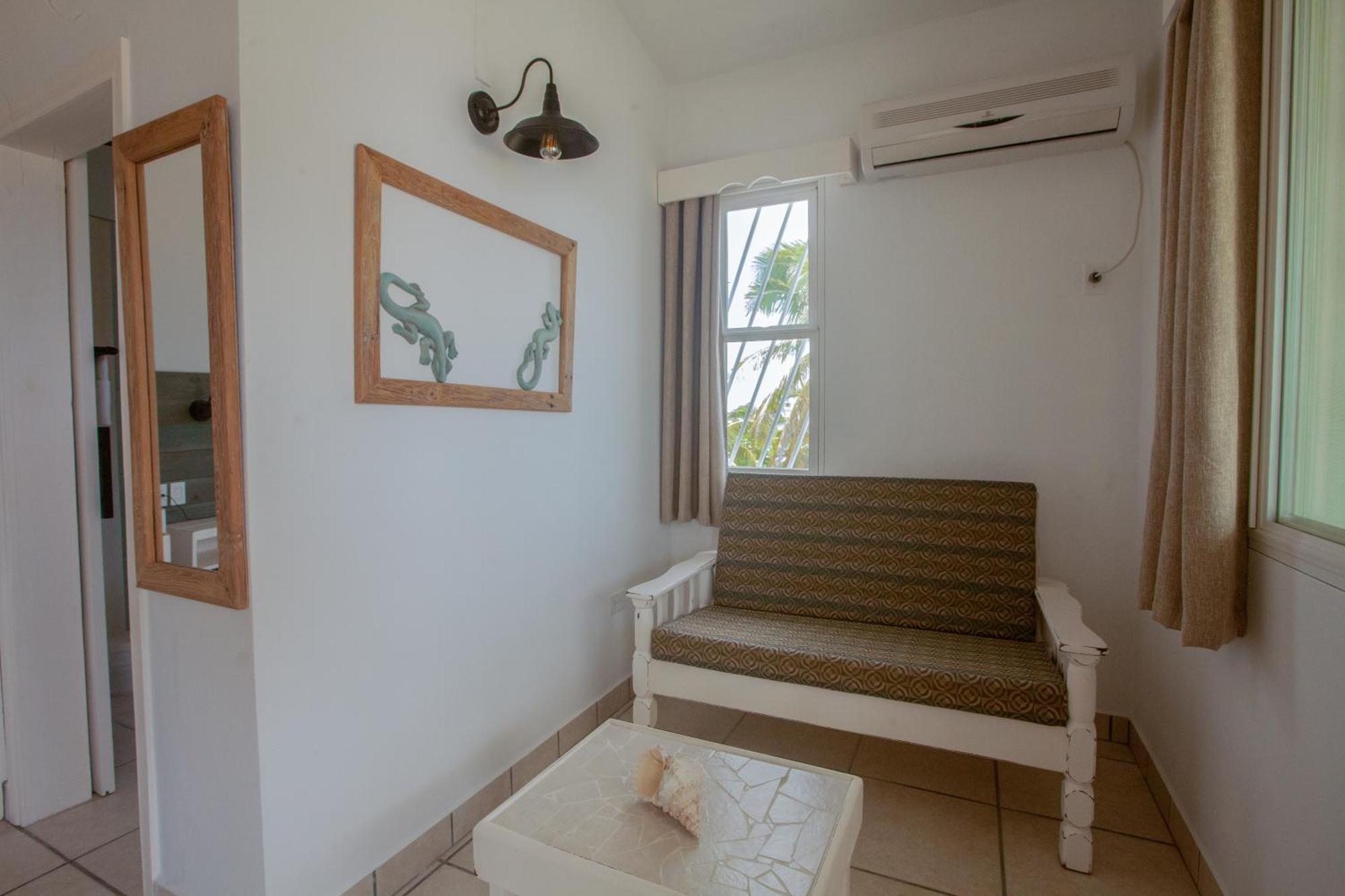 Treetops Hotel Caye Caulker Quarto foto